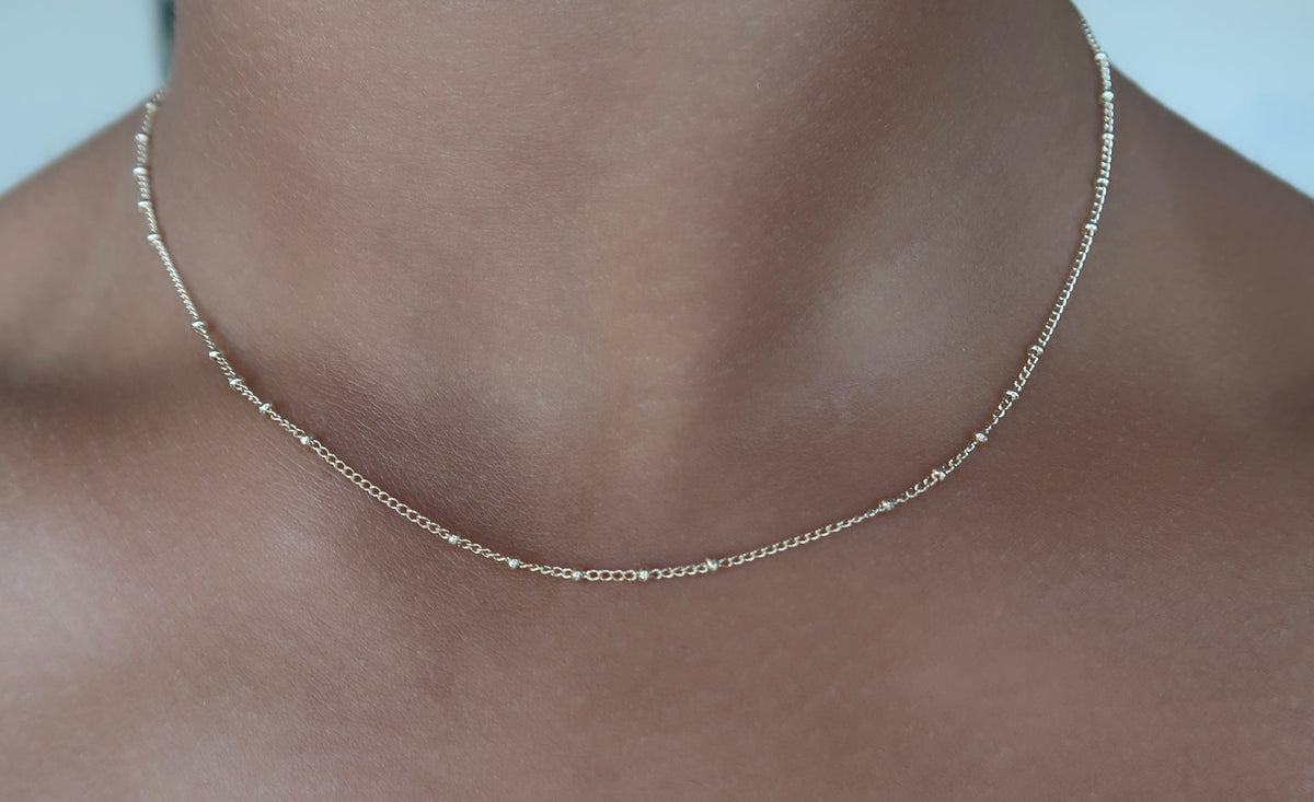 thin ball-beaded necklace